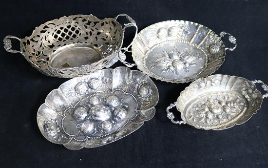 A Dutch two-handled pierced silver basket, Hollandia Zilversmeden (a.f) and three 800 standard oval dishes embossed with fruit,
